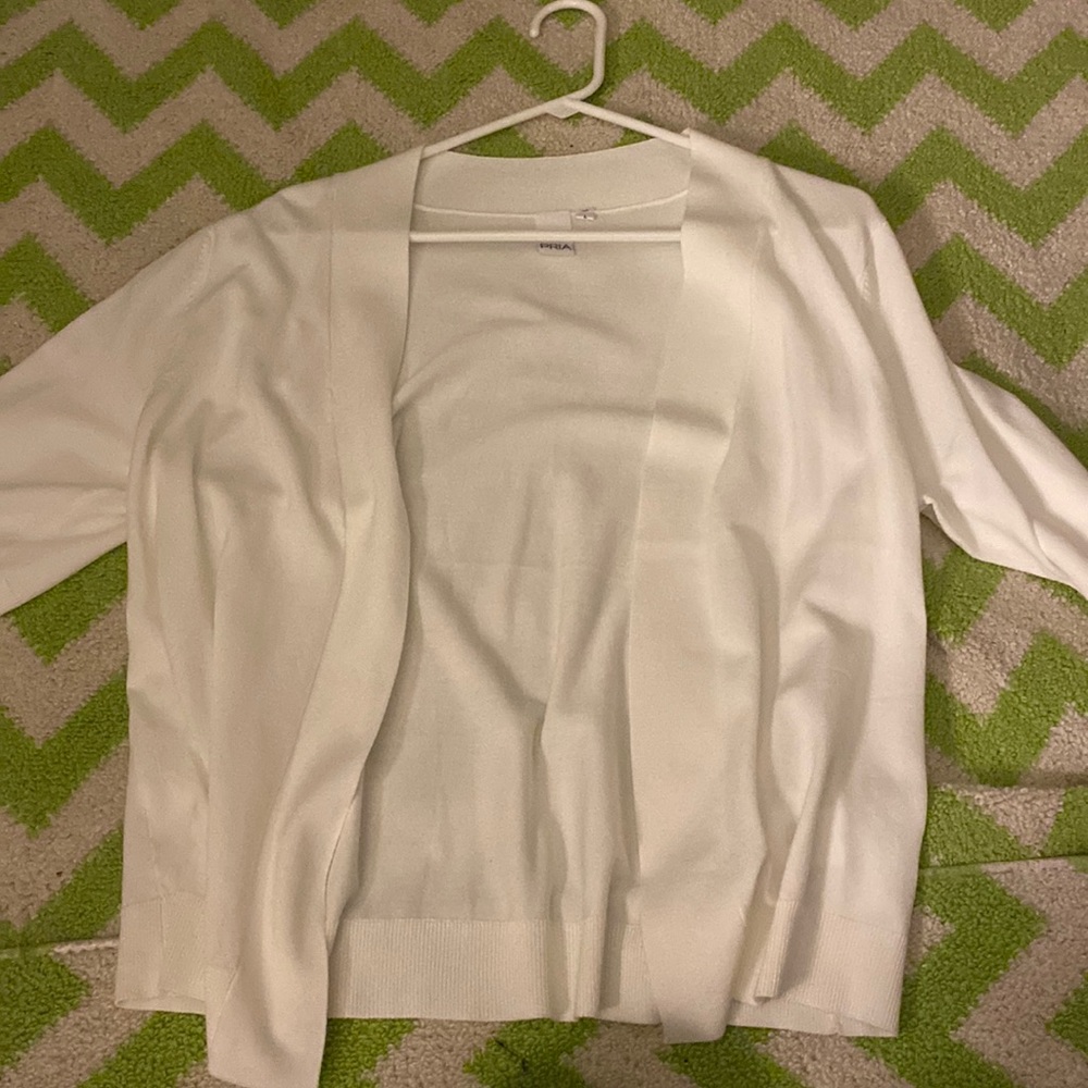 white pria sweater, never worn, size large but fits like a medium